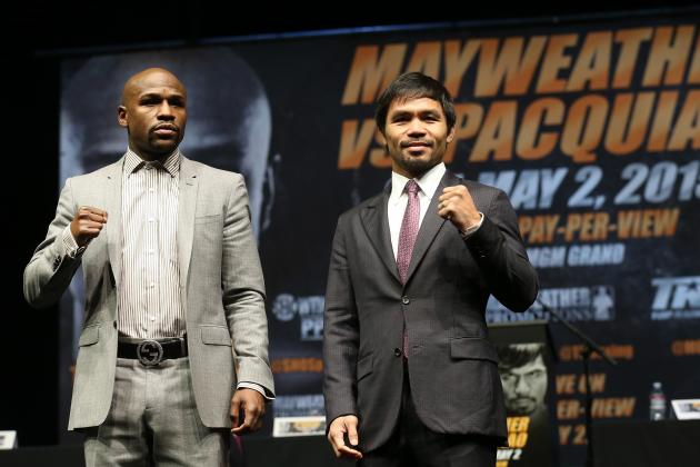 Floyd Mayweather Jr. and Manny Pacquiao pose on a stage before they competed in the boxing match. Mayweather defeated Pacquiao in a boxing match on May 2 at the MGM Grand Garden Arena in Las Vegas, Nevada. 