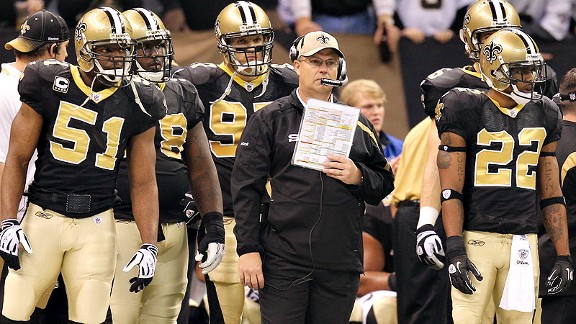 The New Orleans Saints coach deliberates a play call during a game. The Saints were found guilty of the bounty scandal in 2009.