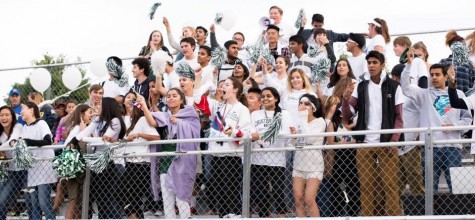 A throng of students roar after the Eagles score a goal. The people behind Harker’s Sports Supporters helped to provide pompoms for fans to cheer on athletes as well as promote the game on social media. 