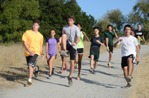 The cross country team prepares for their upcoming fall season during practice.