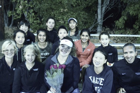 The girls’ tennis team along with Coach Fruttero and Assistant Coach Eileen Schick stand with senior Izzy Gross to celebrate her senior night. The final score was 3-4. 