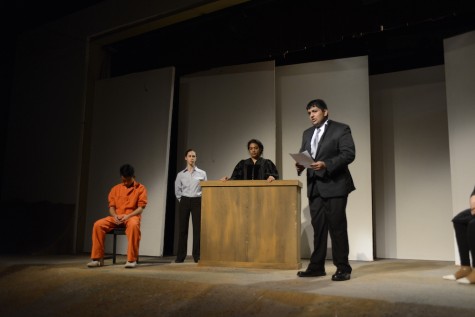Rishabh Chandra (12) portrays Dennis Shepard while reading a statement in court. This will be Rishabh's last fall play.