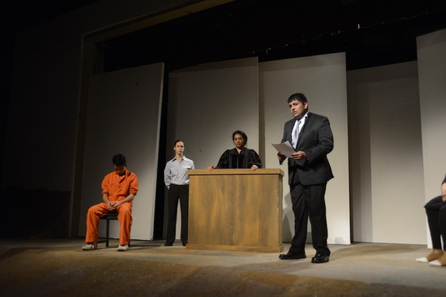Rishabh Chandra (12) portrays Dennis Shepard while reading a statement in court. This will be Rishabhs last fall play.