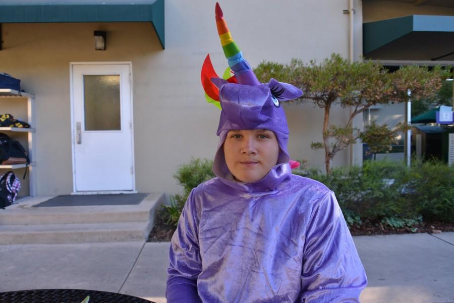 Sophomore+Dolan+Dworak+dressed+up+as+a+rainbow+unicorn.+Students+and+faculty+celebrated+Halloween+yesterday+by+dressing+up+in+costumes.+