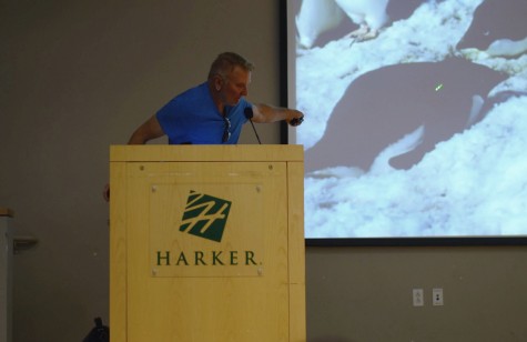 Naturalist Brent Houston gestures to his powerpoint as he talks about his long-term research with penguins. Houston, who traveled with 12 upper school students on the Arctic trip this past summer, spoke about the polar pack ice habitat today during long lunch.