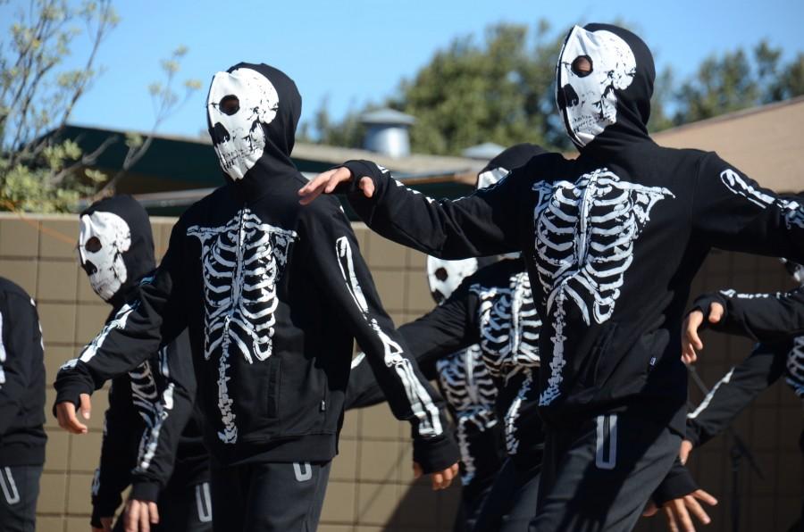 The upper school boys dance troupe, Kinetic Krew, performs. The picnic was held on Oct. 11. 