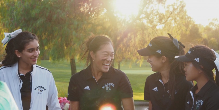 Vanessa Tyagi (10), Ashley Zhong (12), Daphne Liang (12), and Vienna Wang (11) laugh recalling the seniors funny moments of the season. The team had their senior night game on Monday against Mercy High School Burlingame.