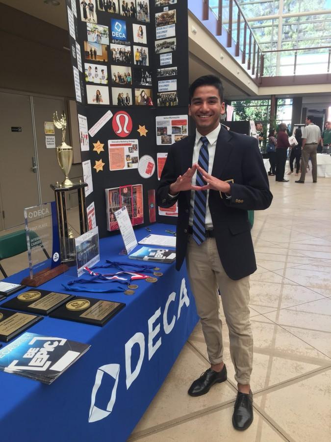 Director of Finance Sanil Rajput introduced the DECA program to prospective students. The open house occurred on Sunday. 