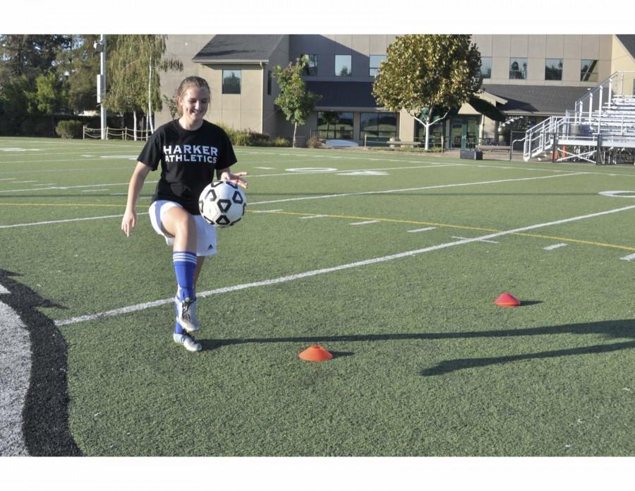 Lyndsey Mitchell (11) juggles a soccer ball at practice. Girls varsity soccer started holding practices for their athletes on Nov 2. 