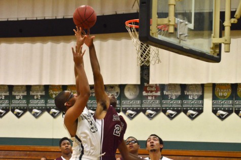 Varsity boys basketball defeats Eastside College Prep 64-53 in first league win