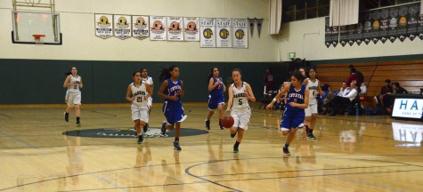 Kailee Gifford (11) steals the ball during varsity basketball team’s match against Crystal Springs.