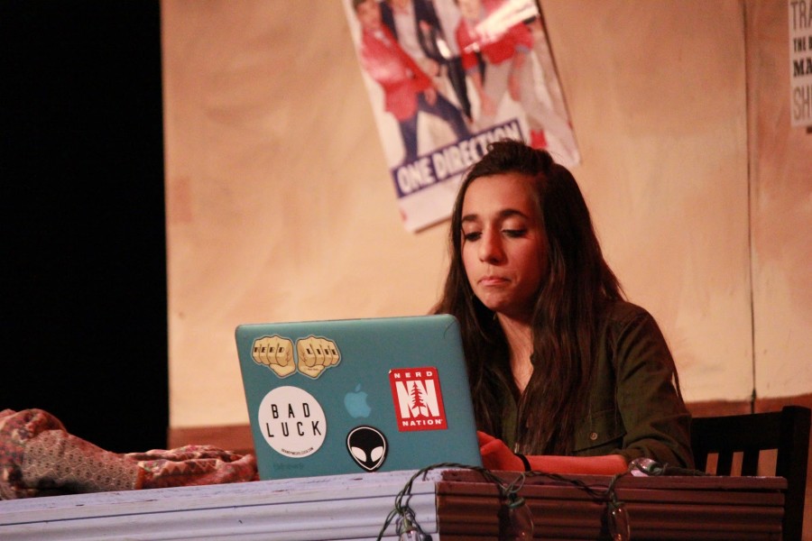 Sameep Mangat (10) types on her laptop during the play The Internet is Distract -- Oh look a kitten! The last SDS show is tonight at 7 p.m. at the Blackford theater. 