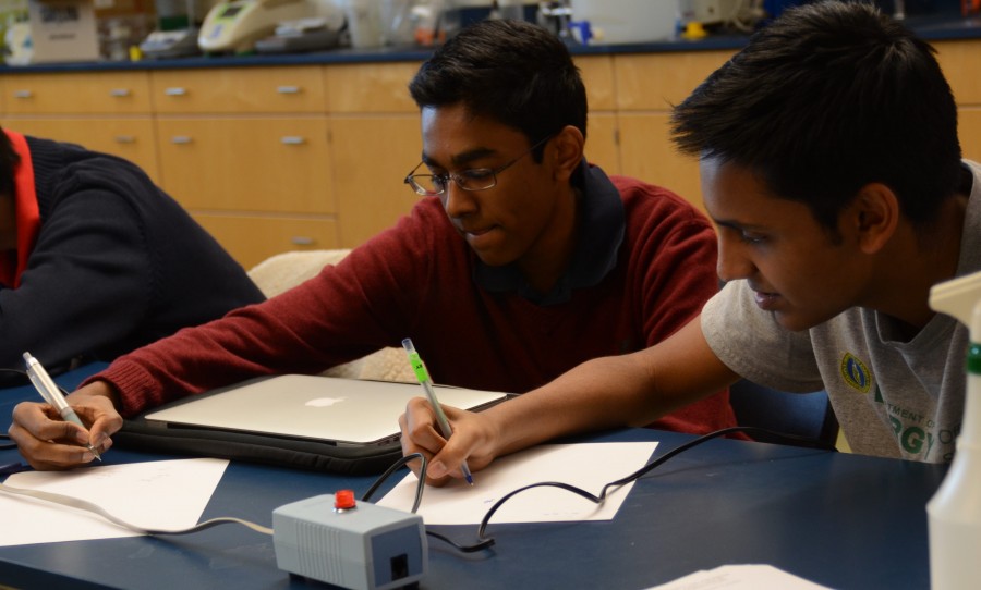 Sophomore Rajiv Movva and junior Arjun Subramaniam attend Science Bowl practice as members of the A team. The regional competition of the Science Bowl will take place Saturday, Feb. 6.