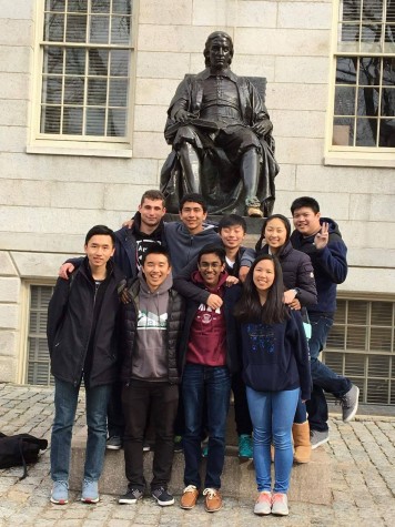 The Harker team poses in front of the John Harvard statue after participating in the Harvard-MIT Math Tournament. The team did not place in the tournament. 