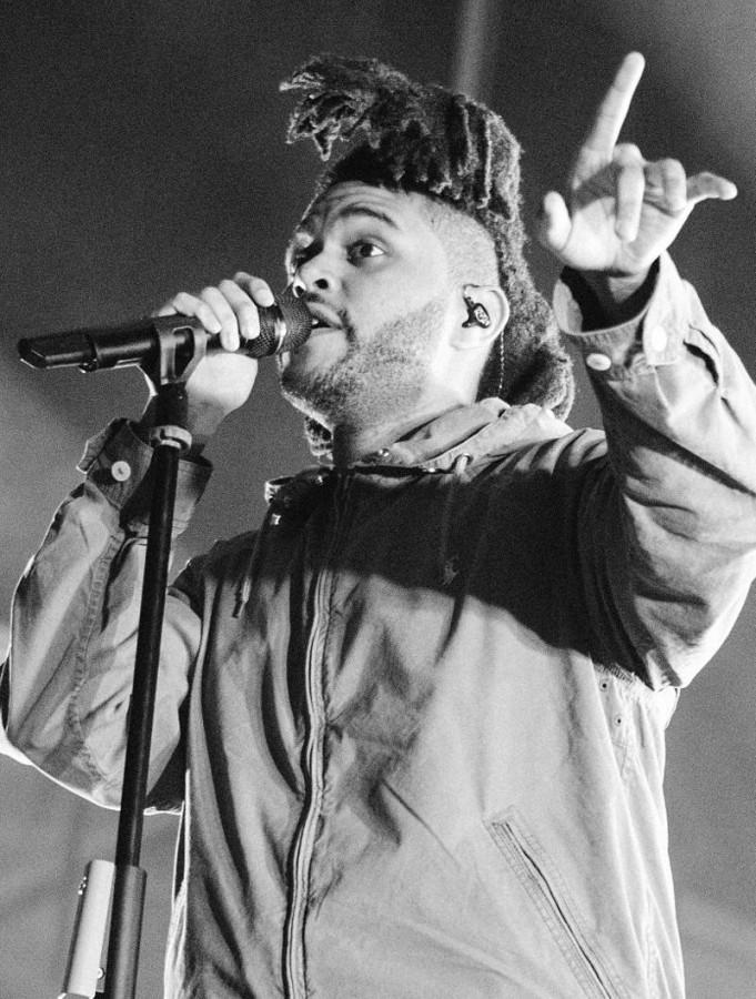 The Weeknd performs at the Bumbershoot 2015 music festival. The Weeknd won two Grammy awards this year. 