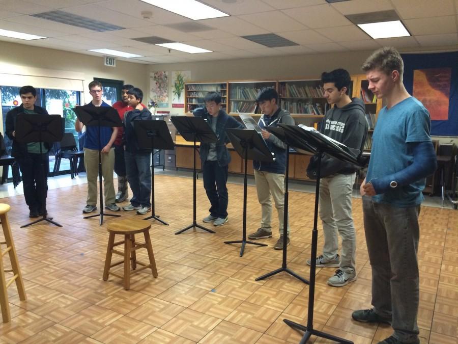 Guys Gig members rehearse with adviser Susan Nace. They will perform in the upcoming spring concert on April 29.