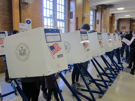In the picture above, U.S. citizens vote at the polls during the 2012 Presidential election. Although critics claim that the media has not done enough to educate voters throughout the 2016 campaigning period, rising voter participation indicates that the mainstream medias coverage could have positive repercussions to democracy.