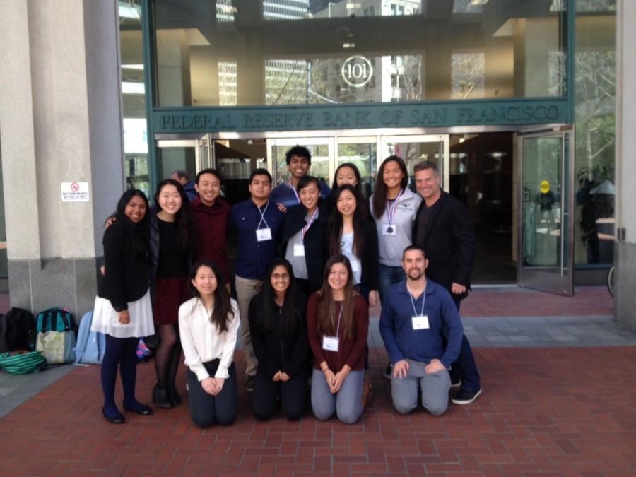 Three NEC teams from the upper school pose in front of the Federal Reserve Bank of San Francisco. The Northern California state competition was held on April 4.