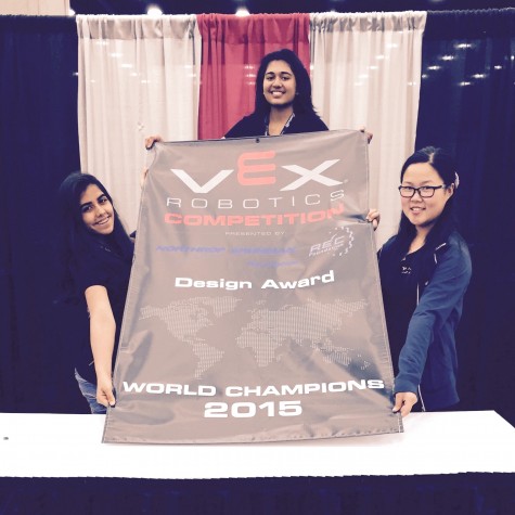 Sophomores Aliesa Bahri, Anooshree Sengputa and Mona Lee pose with their Design Award from the 2015 VEX Robotics Competition World Championships. The team has won awards at the regional, state and international levesl.