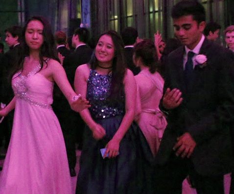 Sophia Luo (12) and Esther Wang (12) dance together. Prom took place at the GlassHouse in 

downtown San Jose from 8:30 to midnight on Saturday.