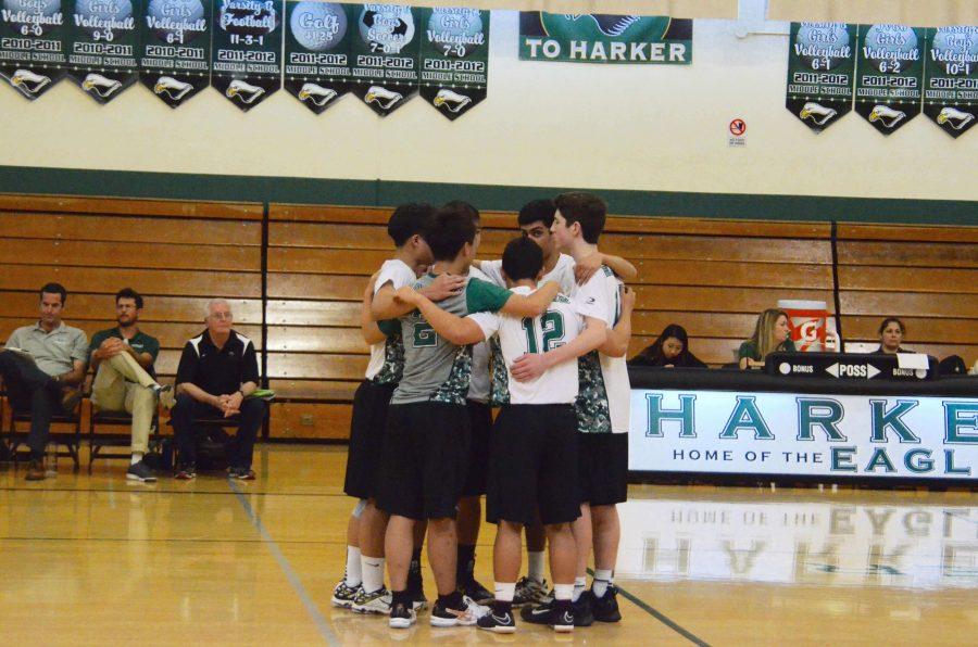 The boys huddle during a timeout in the game. They played a non-conference match against Pacific Collegiate on April 13.