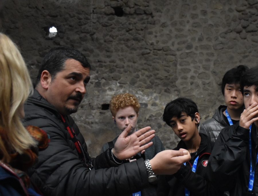 A guide speaks to a group of students in Pompeii, a historical site in Naples, Italy. 2016 marked the first year the Italy and Greece was open to students. 