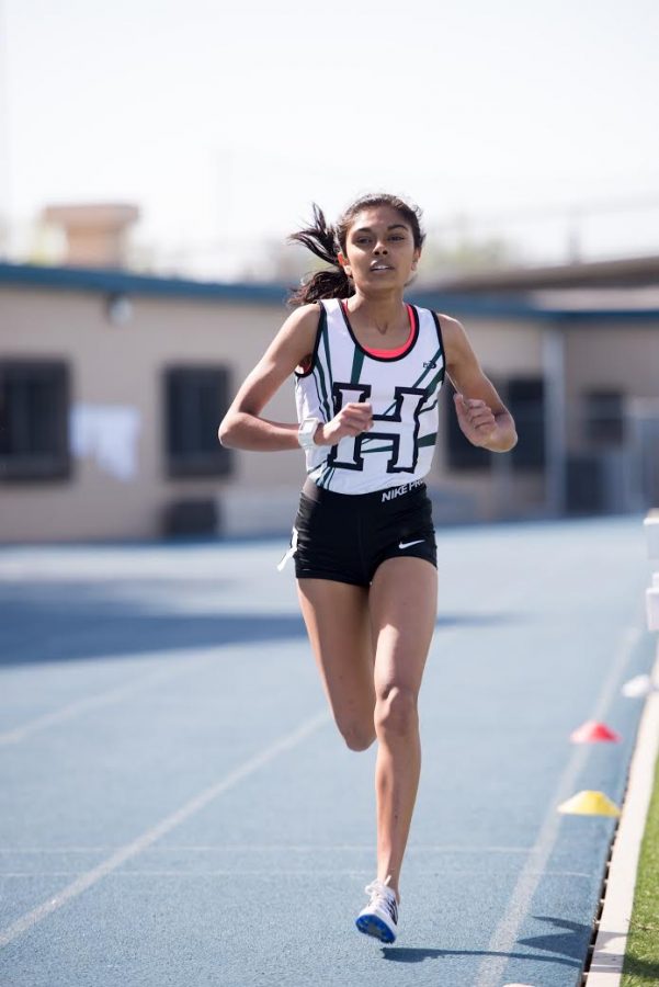 Junior+Niki+Iyer+runs+in+a+track+and+field+meet+at+Bellarmine+College+Preparatory.+She+placed+third+in+the+3200-meter+at+the+state+championships+in+Fresno.