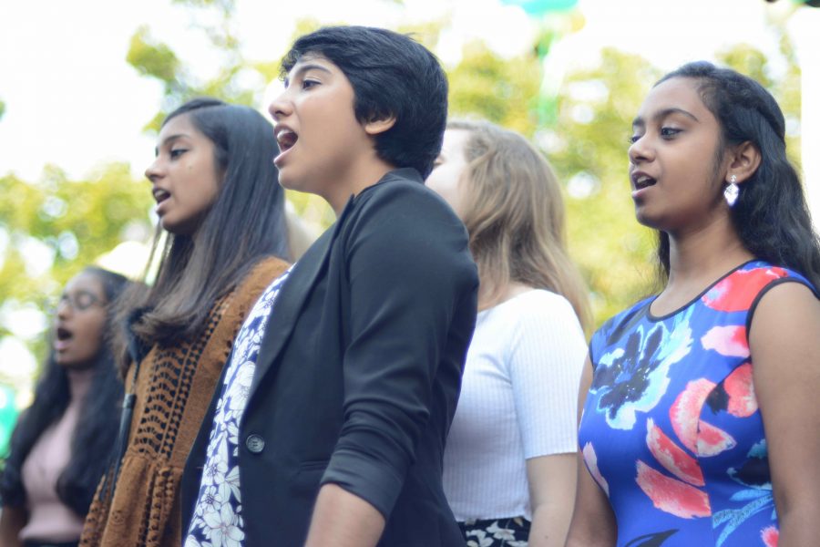 Lead by music teacher Susan Nace, Cantilena sings This Little Light of Mine during the matriculation ceremony. The matriculation ceremony took place on Aug. 19. 