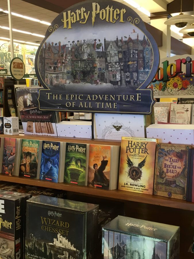 All the Harry Potter books since the beginning are all lined up at the Barnes and Nobles in San Jose. Harry Potter themed board games and other toys are also underneath the display. 