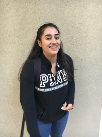 Olivia Esparza (10) models a dark sports jacket from Pink as well as jeans. Students wear longer sleeves and pants as the temperatures drop. 