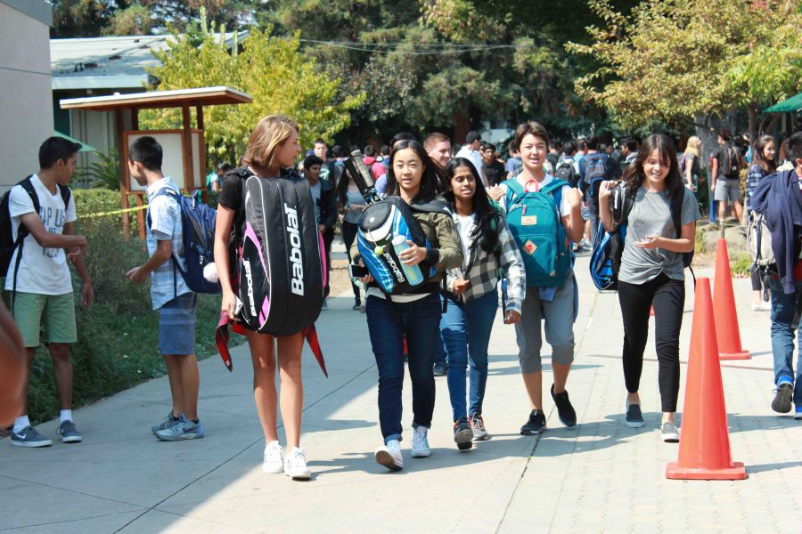 Freshmen walk from class at the end of the day on the first day of school. The new bell schedule was implemented on Aug. 22.