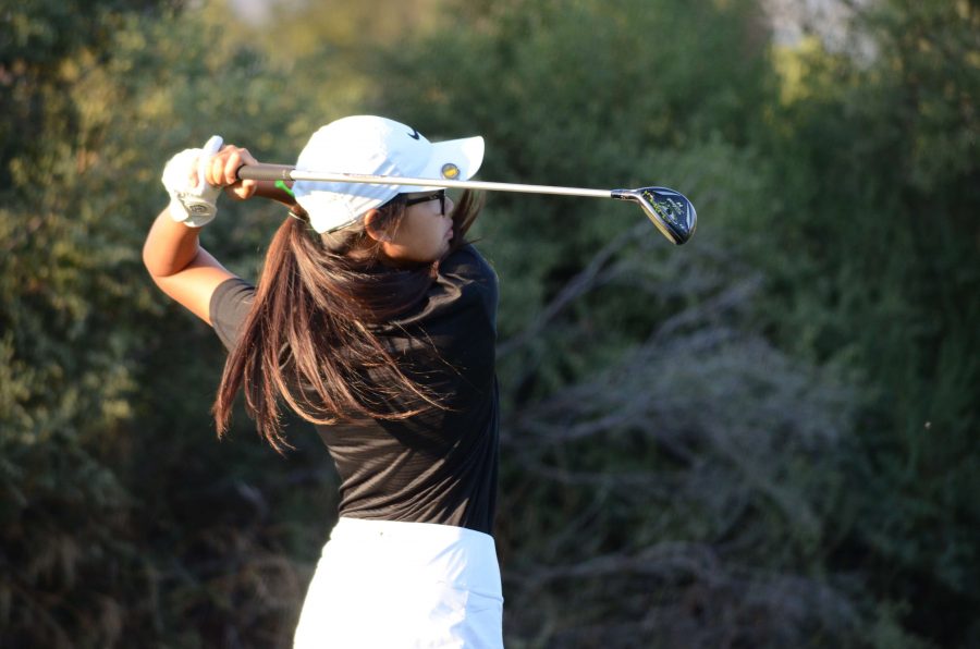  Katelyn Vo (9) follows through on her swing as she tees off at a varsity girls golf game against Sacred Heart Preparatory at Los Lagos Golf Course on Sept. 21. Katelyn and fellow freshman Larissa Tyagi are the only freshmen on the varsity girls golf team.
