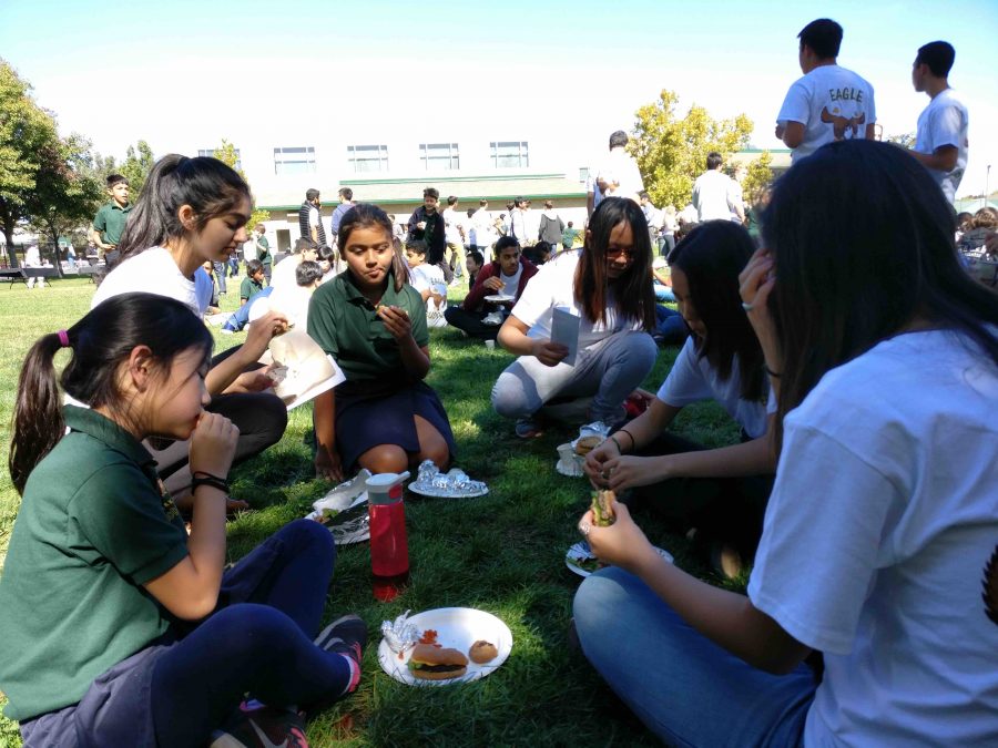 Sophomores Elizabeth Yang, Viveka Saraiya, Annabelle Perng and Erana Wan eat lunch and talk with their Eagle Buddies. The first sophomore Eagle Buddy event of the year took place on Thursday.

