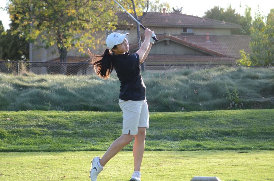 Katherine+Zhu+%2811%29+follows+through+after+her+hit.+Girls+golf+ended+their+season+with+a+ninth+place+finish+at+the+CCS+tournament.