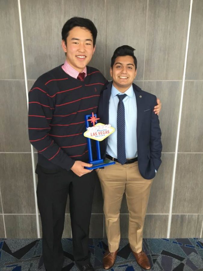 Raymond Xu (12) and Emaad Raghib (12) pose with their award. Competing in a field of 95 teams, Raymond and Emaad placed second, losing to a team from Mission San Jose High School.