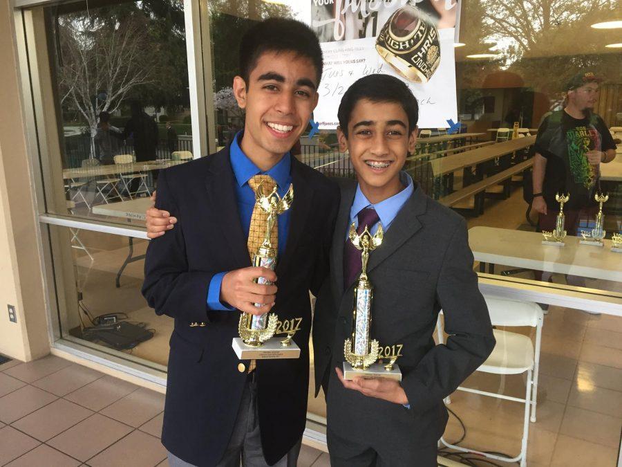 Avi Gulati (9) and Nikhil Dharmaraj (10) pose with their trophies after the California Coast District Tournament. They will represent Harker at the upcoming national tournament.