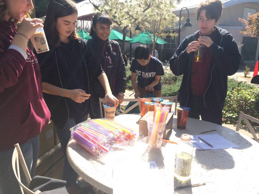 GSA club members Emmy Huchley (10), Sian Smith (10), Damini Kaushik (10), Kevin Huang (12) and Emilie Sanche (10) sell boba outside of Manzanita. GSA members also handed out rainbow smiley stickers to students and faculty on Monday during lunch. 