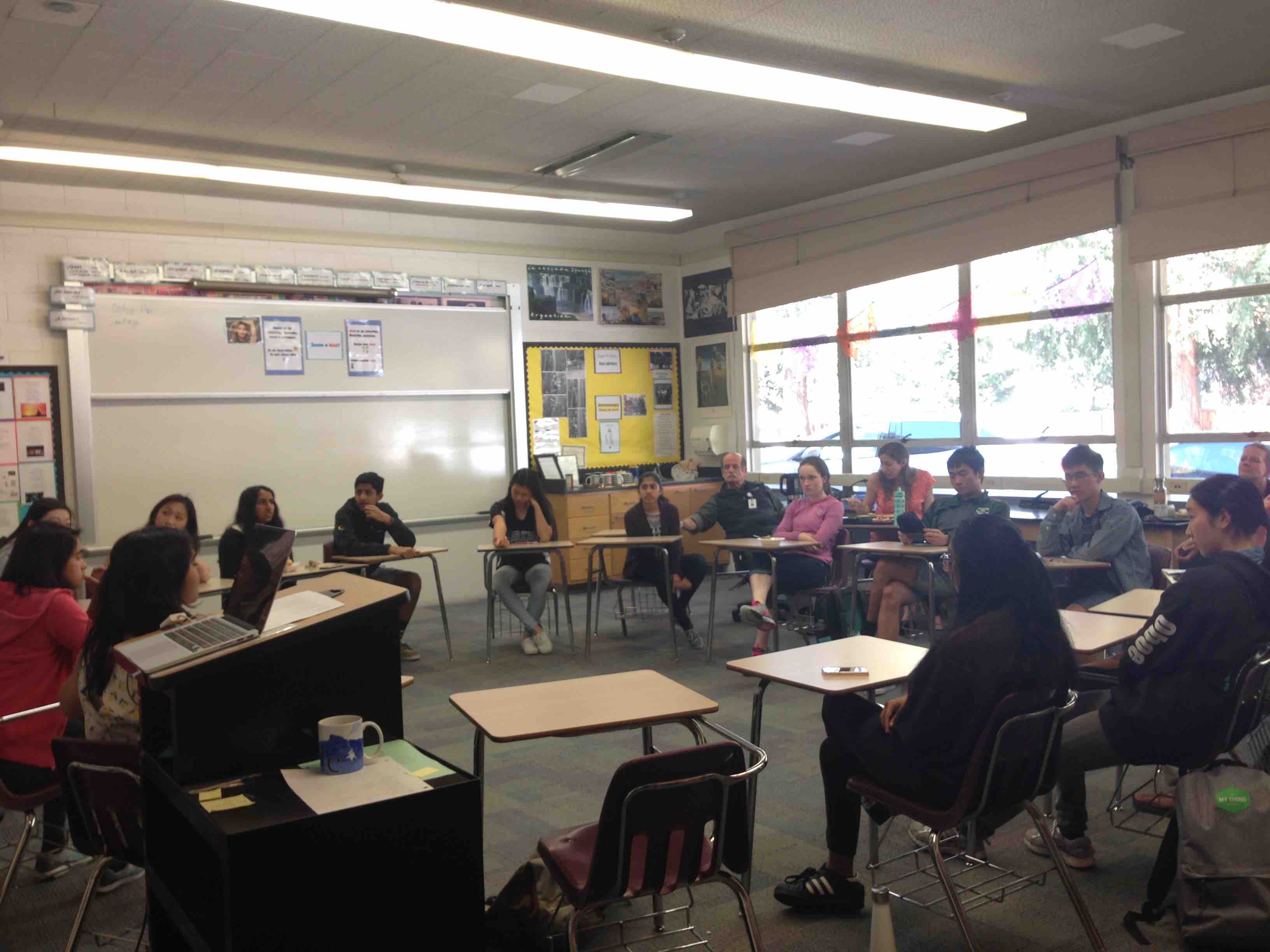 Students and teachers look on as the Green Team present their data collected from a previous survey about Meatless Monday. Many members of the Harker community attended the Meatless Monday forum spearheaded by the Green Team yesterday.