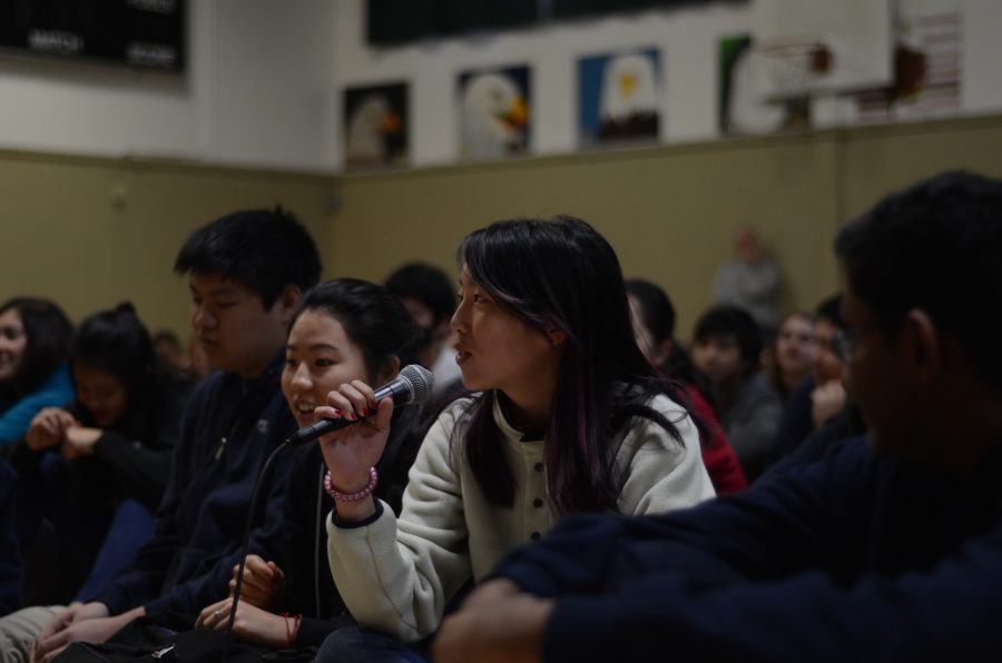 Kaitlyn Nguyen (11) asks candidate for ASB president Jimmy Lin (11) a question. Students were given the opportunity to pose any inquiries or concerns they had about the candidates plans for the next school year following the speeches.
