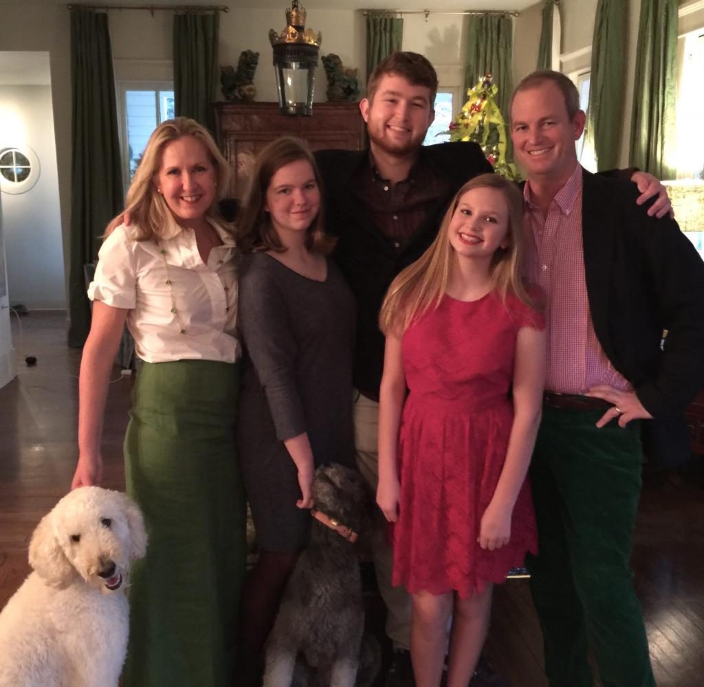 Brian Yager poses for a family photo with his wife and kids. Yager, a California native, is moving to work at the Upper School.