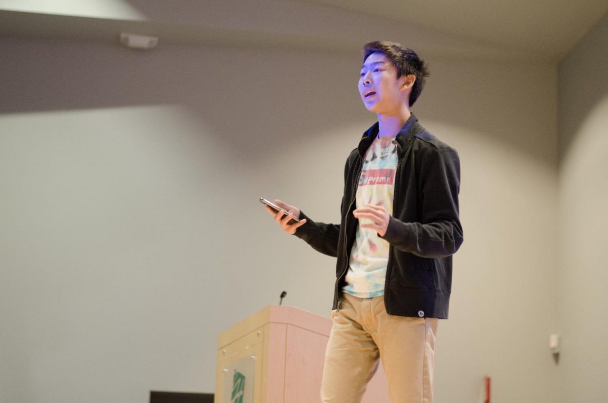 Andrew Lu (9) delivers his election speech in the form of a short skit. The candidates’ speeches varied from promises for change to humorous sketches.