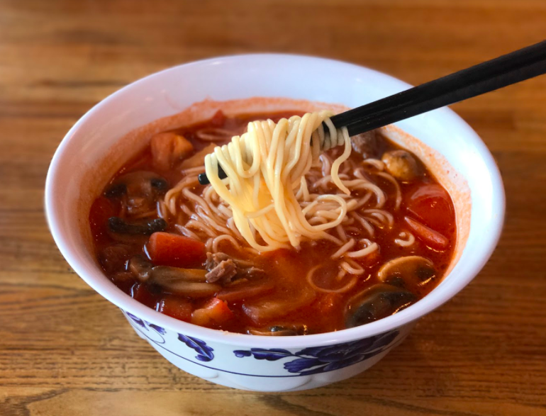 The+popular+%E2%80%9CStewed+Beef%2C+Tomato+%26+Clam+Noodle+Soup%2C%E2%80%9D+which+features+the+house+made+noodles+in+a+rich+tomato+broth%2C+is+filled+with+plenty+of+tender+beef+and+clams+as+well+as+fresh+mushrooms+and+tomato+chunks.+Customers+can+purchase+a+bowl+for+%2410.25.