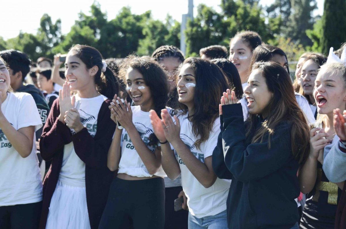 The freshmen clap as members of their class present their Dora-themed skit. The sketch, which featured Class of 2021 dean Jeffrey Draper, concluded with the freshmen rushing to the center of the field to the theme song of “Bill Nye the Science Guy.” 