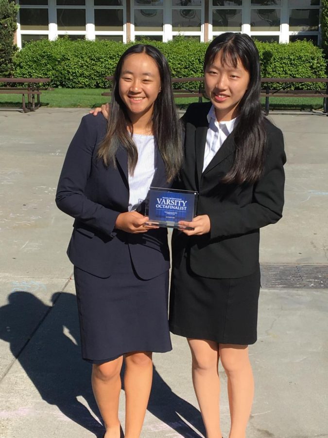 Public forum team Amanda Cheung (10) and Annie Ma (10) pose with their varsity octofinalist award from the Presentation Invitational. Harker had 15 public forum teams competing in the tournament.