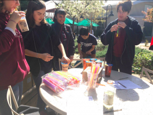 Members of GSA sell boba outside Manzanita during a fundraiser for their club week last year. GSA members handed out stickers to passing students and faculty on Tuesday.