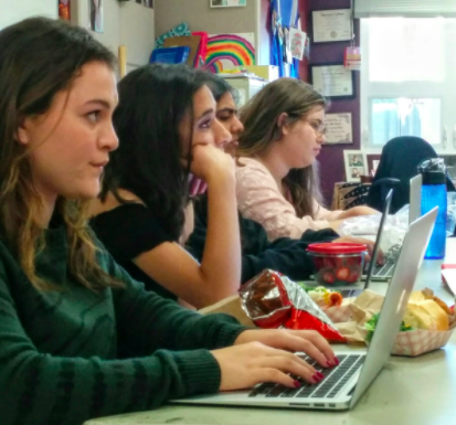 SDS directors Haley Keller (12), Sameep Mangat (12), Anika Banga (12) and Jessica Skinner (12) take notes during the initial round of auditions on Monday and Tuesday. "To be able to share all of that [with them] is incredible… to teach something you’re so personally passionate about is just a joy," performing arts director Laura Lang-Ree said.
