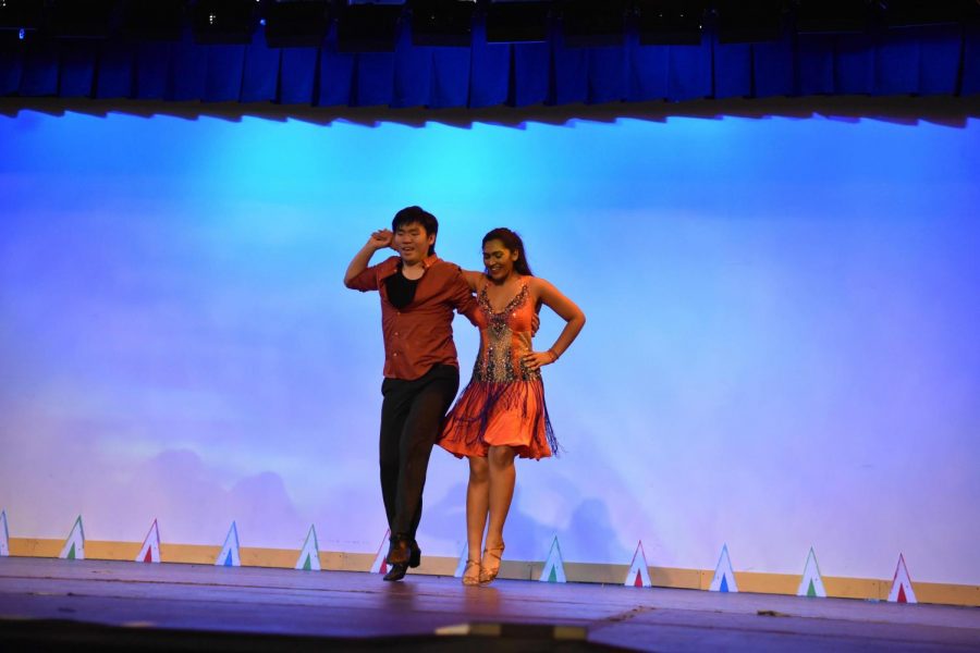 Timothy Wang (10) and Riya Chandra (12) dance to the song "Great Balls of Fire" by Jerry Lee Lewis. This routine was the only jive number in last year's dance production.