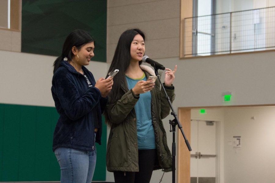 TEDx curators Anooshree Sengupta (12) and Kaitlin Hsu (12) announce tomorrow's TEDx event. Held in Nichols, the event will feature five speakers, including Andy Semenza (12), and six company product booths.