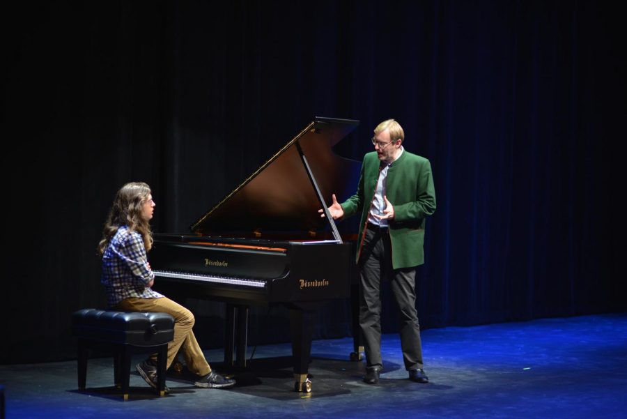 Pianist Jan Jiracek von Arnim delivers his comments on Andy Semenza's (12) performance in the piano masterclass held in the Patil Theater yesterday. Jiracek von Arnim also advised pianist Jessica Jiang (10) during the event.