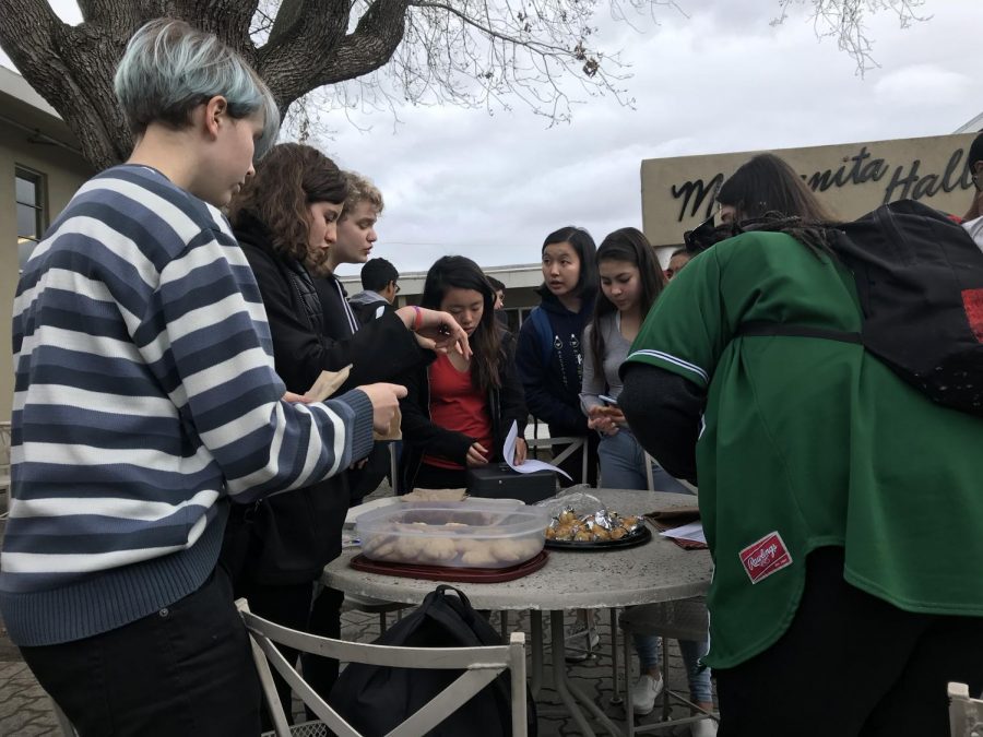 GSA sells baked goods along with rainbow bracelets after school on Tuesday. The first 600 dollars made will go to Outlet, a charity that offers counseling to LGBTQ+ youth, and the rest will go to Casa Ruby, a charity that gives temporary shelter and food to the most vulnerable of the LGBTQ+ community.